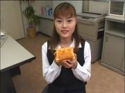 Office worker eats a slice of toast