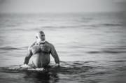 This sexy man in the ocean