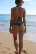 Sexy green bikini on the beach