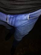 Squeezing a hard cock into tight jeans