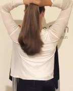 Brunette ponytail handle