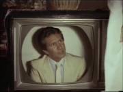 Honey Wilder fantasizes about fucking Eric Edwards through the TV in Private Teacher (1983)