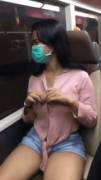 [GIF] Chinese Girl Flashes Her Sizeable Tits in the Window of a Moving Train