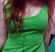 Pretty redhead in a green shirt