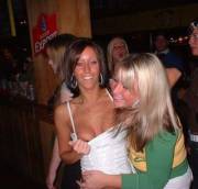 Flashing a nipple in the bar