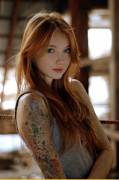 Red hair and a sleeve tattoo