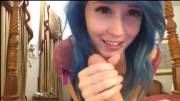 Cute blue - haired girl offering a blowjob