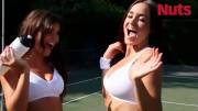 India Reynolds and Rosie Jones on tennis court