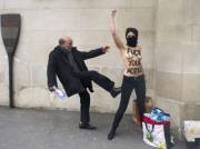 Old man has enough with Femen protesters.