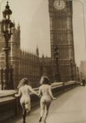 Two women running towards Big Ben.