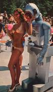 girl posing with a robot