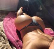 Over the shoulder sunbathing selfies are the best
