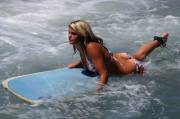 Blonde surfing girl