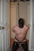 Tied, hooded, and vibed in a door frame. (Self bondage)