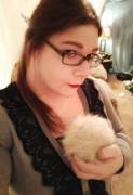 Cuddling up with a good book and my pet tribble!