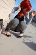 Dyed red hair, wetting her pants outside