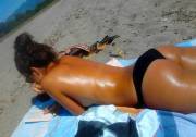Sunbathing topless