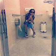 Charli XCX on the toilet