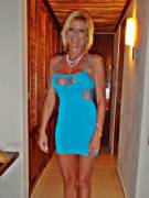 Blonde cougar in tight dress