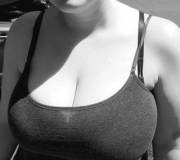 my g[f] isn't afraid to stretch out her tanktops in public. i certainly don't mind.