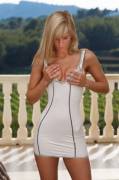 Miela A pulling down a very figure-hugging minidress (34 images)