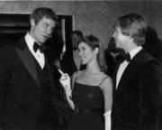 Old photo of Carrie, Mark, and Harrison. Looks like Carrie's dress is a little see-through.