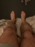 Thick hairy calves and size 12s relaxing in bed