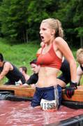 Tough mudder girl drops in cold water