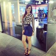 Prissila Sánchez - Tight blue mini skirt on set
