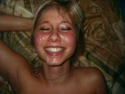 Having a GREAT time getting jizz blown all over her face!