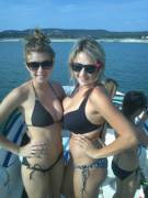 Black bikinis on a boat
