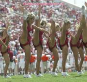 Group of Cheerleaders Kicking Upskirt