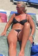 Amazing older woman at the beach, showing off!