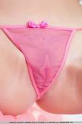 Behind pink panties