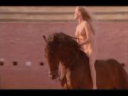 Bo Derek riding a horse naked