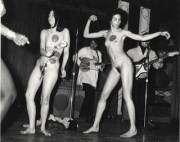 Naked girls dancing with a rock band during a Body Festival, organized by artist Yayoi Kusama, New York, ca.1967.