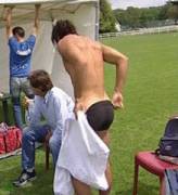 French Rugby Player Clement Poitrenaud stripping on the pitch (GIF)