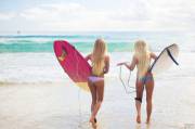 Two bleach blonde surfer chicks