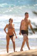 Lara Bingle topless on beach in Hawaii