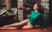 Pinup model wearing tights in a hunting lodge