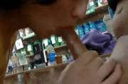 Blowjob in a store
