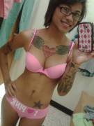 Tattooed girl in pink