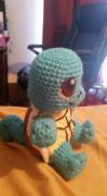 I crocheted a Squirtle. I had to learn needle felting today to do the eyes. :-)