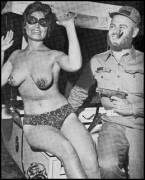 "A Castro impersonator pulls a gun on unafraid Chris Darling" • Artists &amp; Models Ball, Miami Ace; December 1959