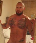 Tattooed and beefy