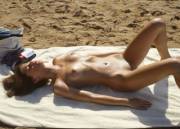 Beautiful naked chick sunbathing