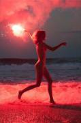 Running naked on the beach while shooting off fireworks