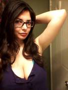 Girl in glasses takes glorious selfie starring her cleavage