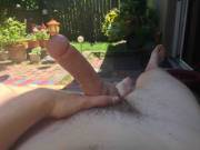 stroking in the shade with neighbors outside