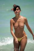 Sexy babe topless at the beach